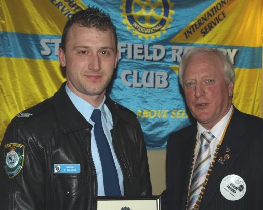 Senior Constable Paul Wearne from Flemington Command and President Kevin Freund